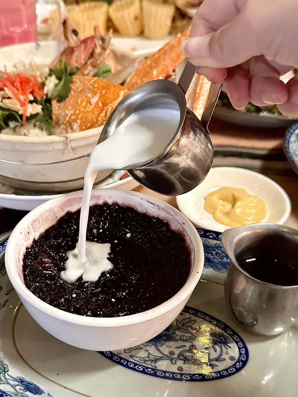Black sticky rice dessert with coconut milk